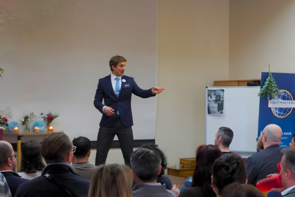 men on stage infront of crowd